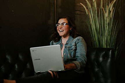 Female smiling studying