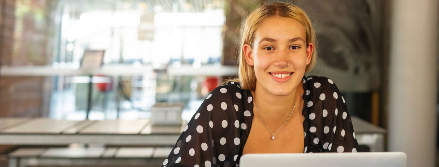 Student female studying laptop