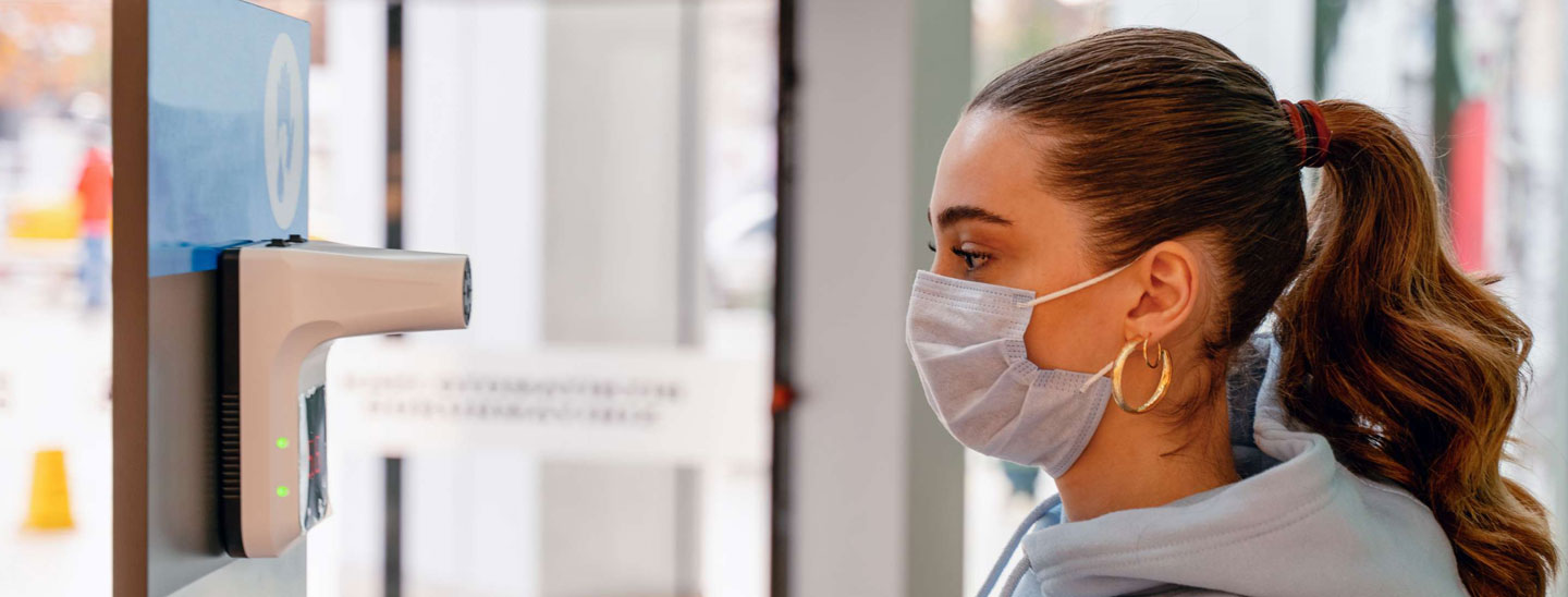 Student in medical centre mask