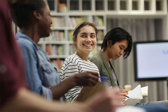 Students campus smiling working together