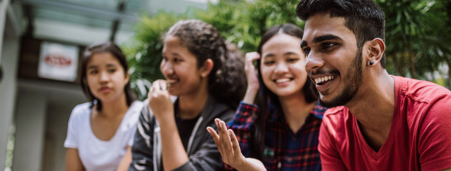 Students group talking outside