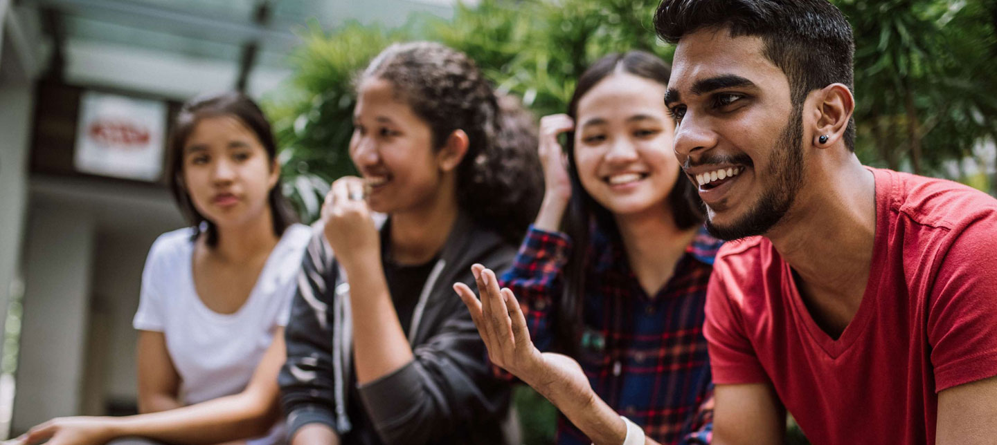 Students group talking outside