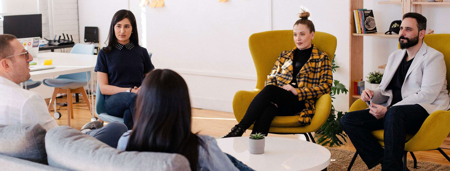 Students sitting in a group meeting