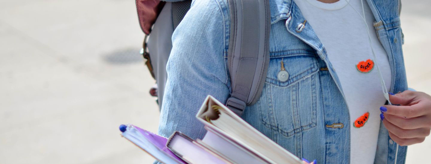 Woman carrying books